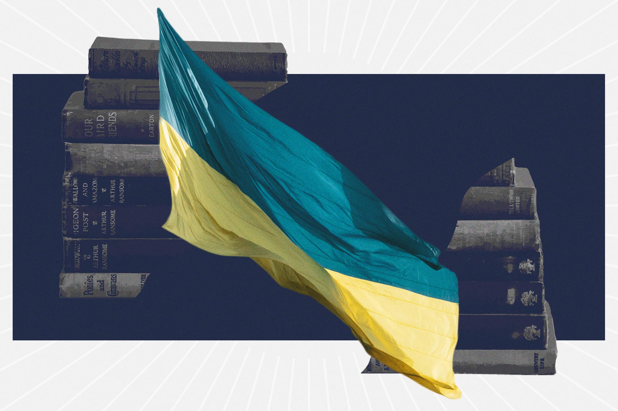 Ukraine Flag in front of a stack of books on a table