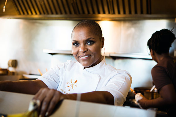 Portrait of Tanya Holland in her kitchen