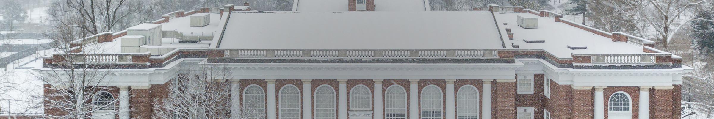 A portrait banner of a snow-covered building.