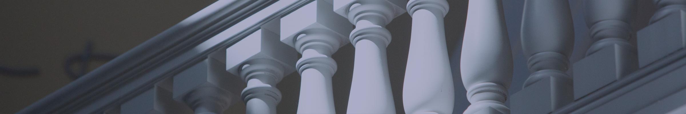 A banner portrait of a balconies railing.